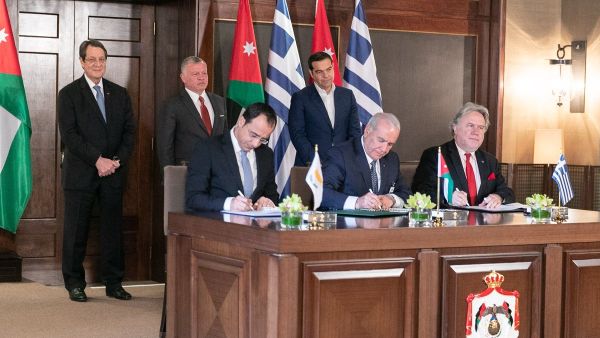 King Abdullah II, President of Cyprus Nicos Anastasiades and Prime Minister of #Greece Alexis Tsipras witness the signing of agreements and memorandums of understanding between the three countries. (Twitter/ @RHCJO)