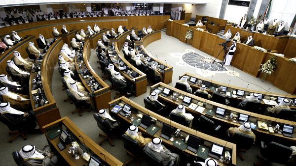 Kuwaiti members of parliament attend the opening session of a new parliamentary term in Kuwait City [YASSER AL-ZAYYAT/AFP/Getty Images]