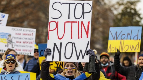 People participate in a pro-Ukrainian demonstration in front of the White House to protest the Russian Invasion of Ukraine on February 26, 2022 in Washington, DC. Samuel Corum/Getty Images/AFP Kremlin spokesperson