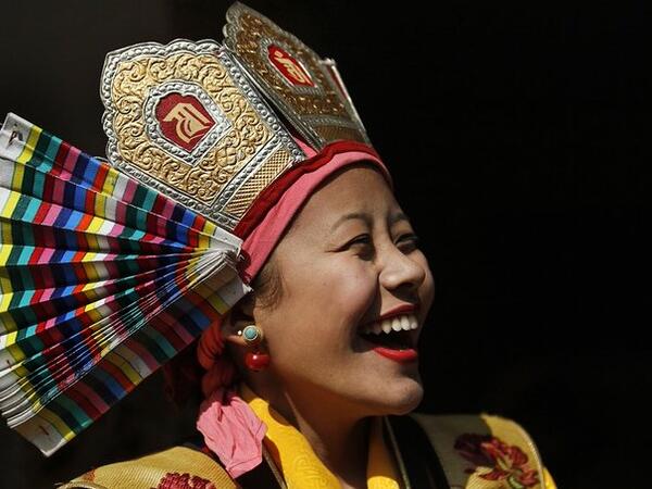 Woman in traditional dress during Tibetan New Year in Kathmandu (Twitter)