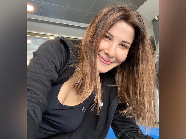 Nancy Ajram taking selfies from home