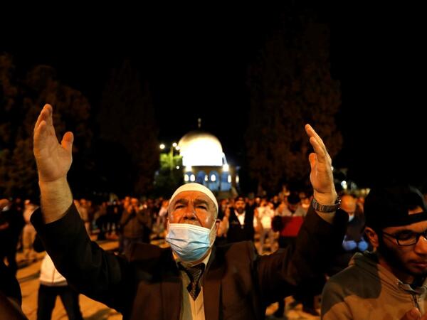 Palestinian Muslim worshippers pray at the al-Aqsa mosque compound, in Jerusalem's Old City on May 31, 2020, after a two-month closure due to the COVID-19 pandemic. Ahmad GHARABLI / AFP