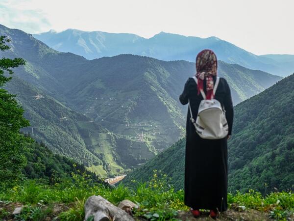 A villager stands at a high point to survey the damage to the hill sides by quarrying in Ikizdere in the Rize Province in the Black Sea region of Turkey on June 7, 2021. A government-friendly company plans to extract 20 million tons of stone from a quarry in the northeastern town of Ikizdere for one of President Recep Tayyip Erdogan's latest development projects. The locals are rising up in protest, challenging the government and its priorities in a region dear to the domineering Turkish leader's heart. 