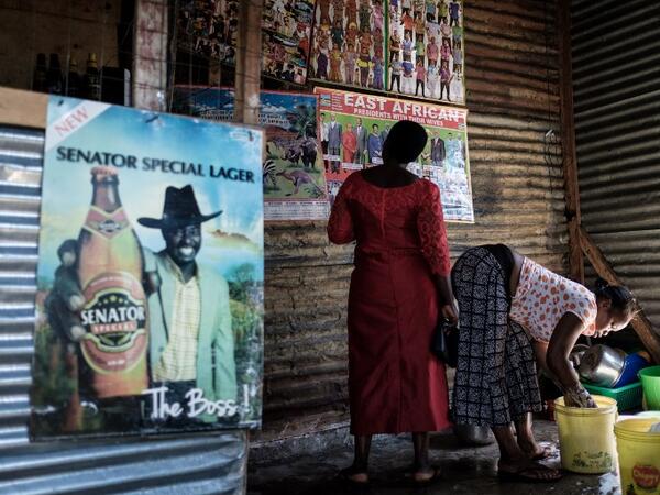 A woman cleans her bar on Migingo island on October 5, 2018 which is densely populated by residents fishing mainly for Nile perch in Lake Victoria on the border of Uganda and Kenya.
Yasuyoshi CHIBA / AFP