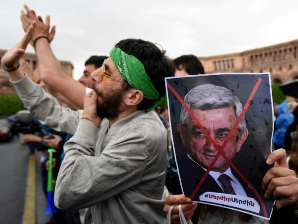 Protesters held rallies in recent days in the Armenian capital Yerevan to in the denounce Sarkisian's efforts to remain in power as prime minister. (AFP/File Photo)	