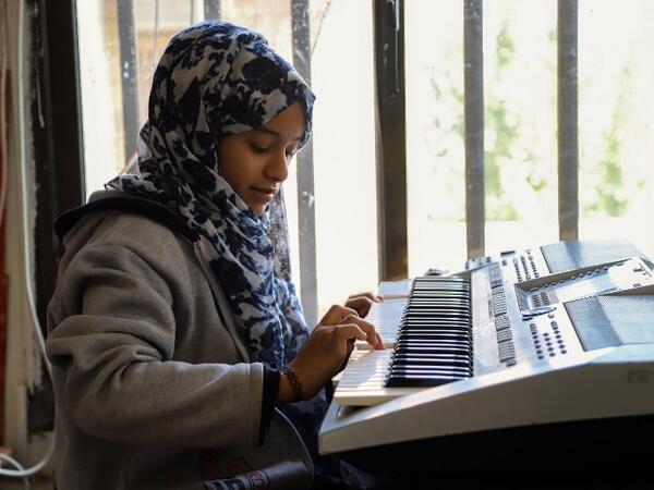Children attend a music class at the Al-Nawras school in Taez, Yemen's third city, in the country's southwest
AHMAD AL-BASHA / AFP