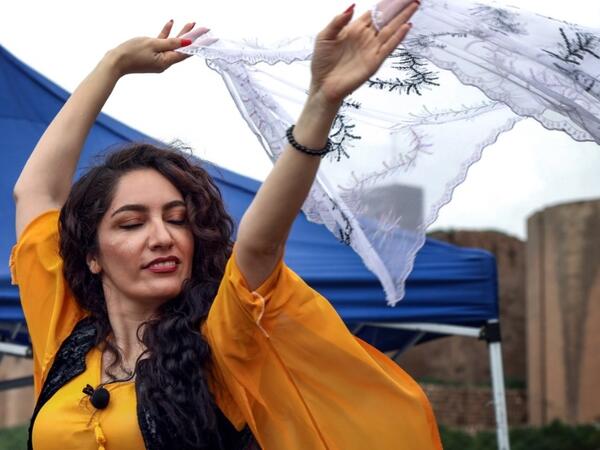 An Iraqi Kurdish actress performs in an open-air play in Arbil, the capital of the northern Iraqi Kurdish autonomous region (AFP)