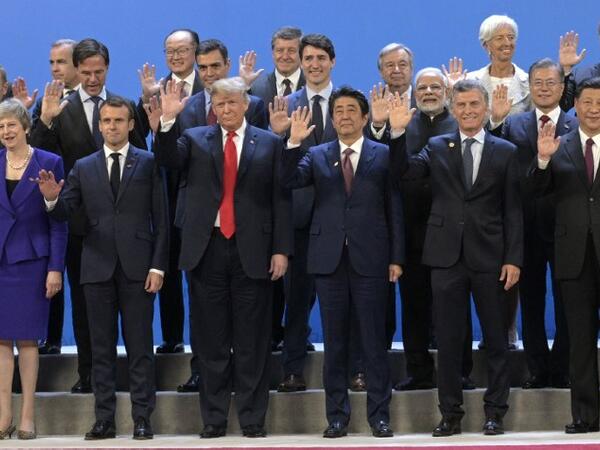 Participants of the G20 Leaders' Summit in Buenos Aires, pose for a family photo on November 30, 2018. Global leaders gather in the Argentine capital for a two-day G20 summit likely to be dominated by simmering international tensions over trade.
JUAN MABROMATA / AFP