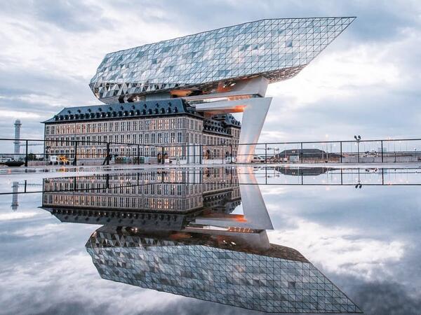The new Port House in Antwerp repurposes, renovates and extends a derelict fire station into a new headquarters for the port – bringing together the port’s 500 staff that previously worked in separate buildings around the city (Twitter) 