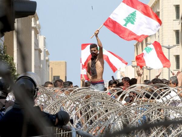 protester Lebanese flag