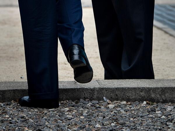 US President Donald Trump steps into North Korea as North Korea's leader Kim Jong-un waits in the Demilitarized Zone (DMZ) on June 30, 2019, in Panmunjom, Korea.  Brendan Smialowski / AFP