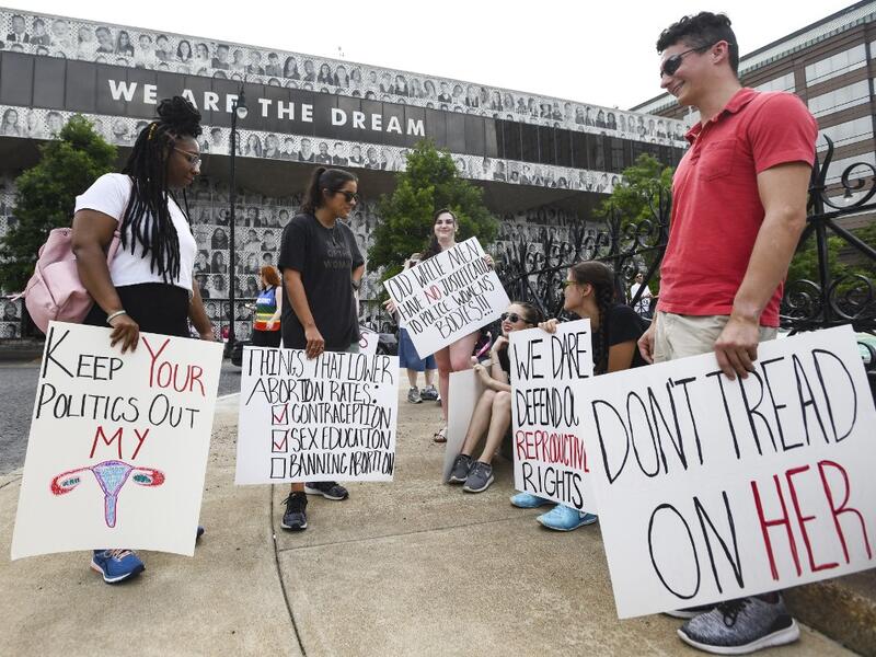 Protestors prepare to participate in a rally against one of the nation's most restrictive bans on abortions on May 19, 2019 in Montgomery, Alabama. Julie Bennett/Getty Images/AFP