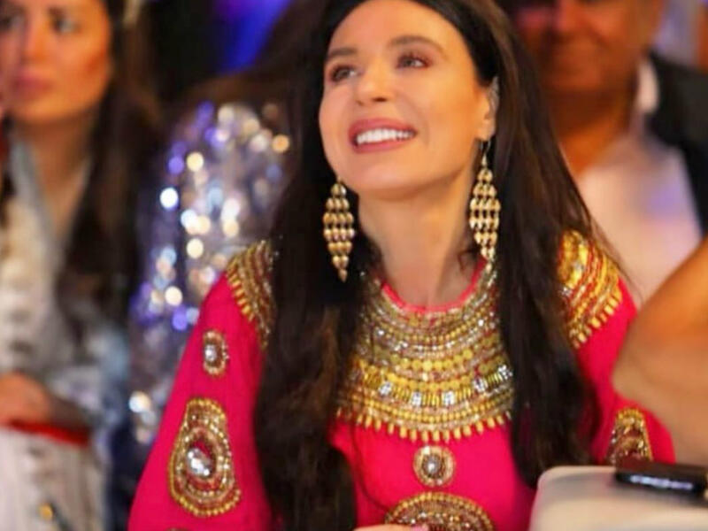 Dinas cloak at the opening of one of the Ramadan Tents