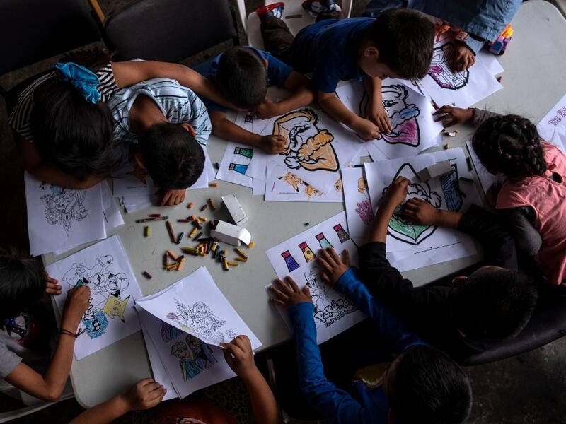 Minor migrants seeking for asylum in the United States draw in Juventud 2000 migrant shelter in Tijuana, Baja California state, on June 19, 2019, Mexico ahead of World Refugees Day. World Refugee Day is observed June 20 each year internationally to raise awareness of the situation of refugees throughout the world.  (Guillermo Arias / AFP)
