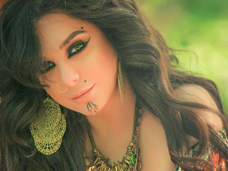 In her latest photos Fawakherji appeared in bright colored clothes and wavy hair Source sulaffawakherji Instagram