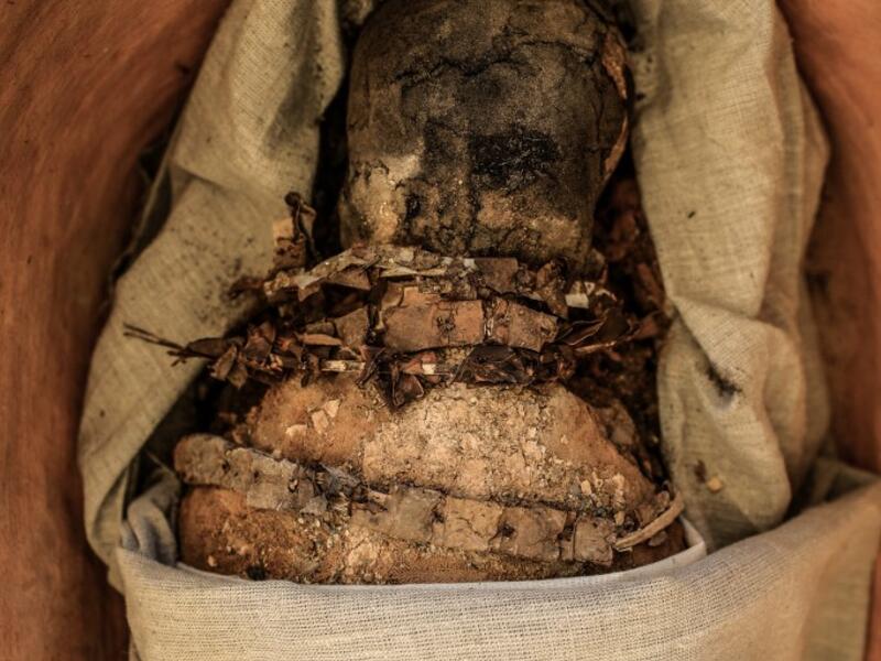 A sarcophagus, part of a new discovery carried out almost 300 meters south of King Amenemhat II’s pyramid at Dahshur necropolis, is exposed near the Bent Pyramid, about 40km (25 miles) south of the Egyptian capital Cairo, during an inaugural ceremony of the pyramid and its satellites, on July 13, 2019. Mohamed el-Shahed / AFP