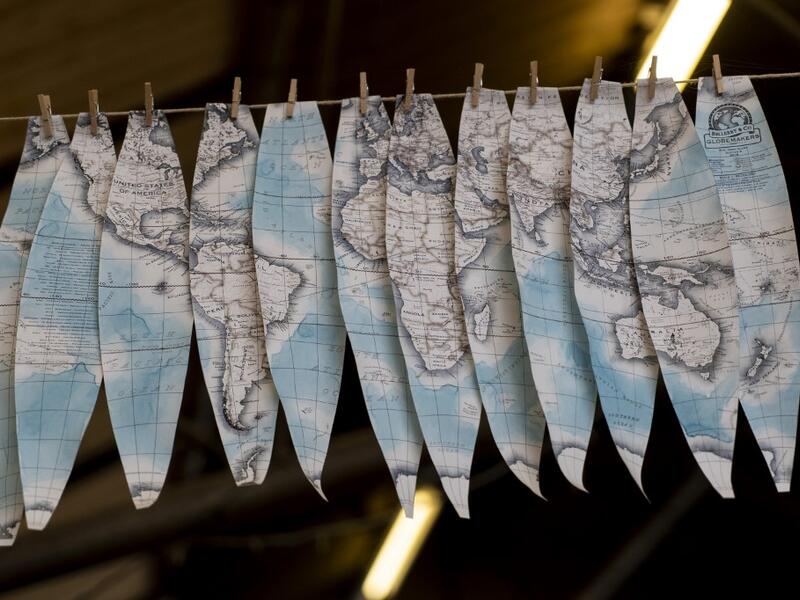 Hand-painted cartography on oval shaped strips called "gores" dry at the Bellerby and Co Globemakers' workshop and headquarters in Stoke Newington in north London, on July 19, 2019. Niklas HALLE'N / AFP