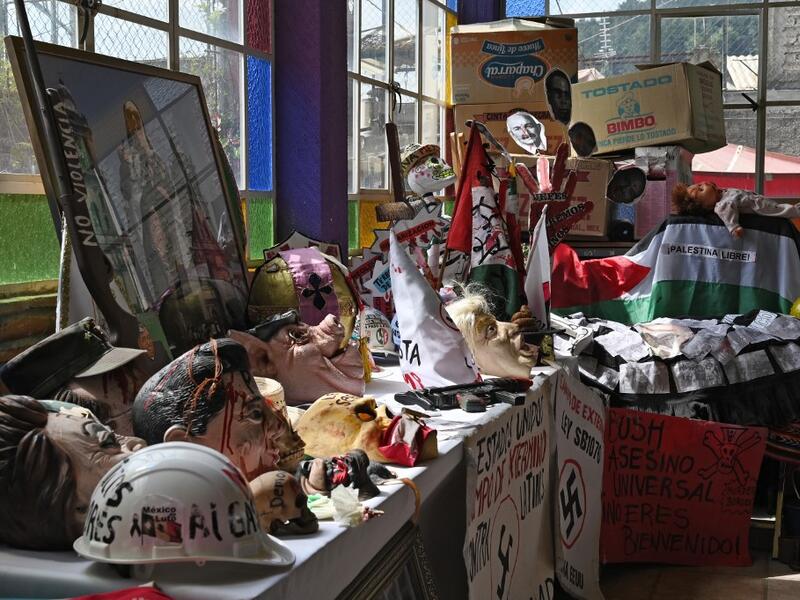 View of parts of objects used by Mexican activist Julia Klug in protests, including a flag reading "Free Palestine" in Mexico City on August 08, 2019. RODRIGO ARANGUA / AFP