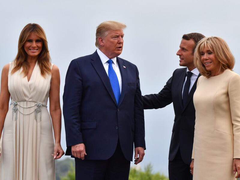 French President Emmanuel Macron (2ndR) and his wife Brigitte Macron (R) pose with US President Donald Trump (2ndL) and US First Lady Melania Trump at the Biarritz lighthouse, southwestern France, ahead of a working dinner on August 24, 2019. Nicholas Kamm / AFP