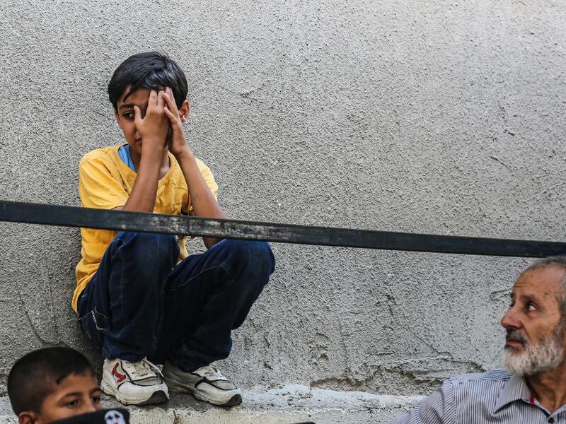 A boy relative of Hamas security member Salama al-Nadeem, 32, mourns during his funeral in Gaza City on 28, 2019. (AFP/ File Photo)