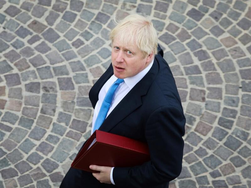 British Prime Minister Boris Johnson walks towards his meeting in Biarritz, south-west France, on the third day of the annual G7 Summit. (AFP/ File Photo)
