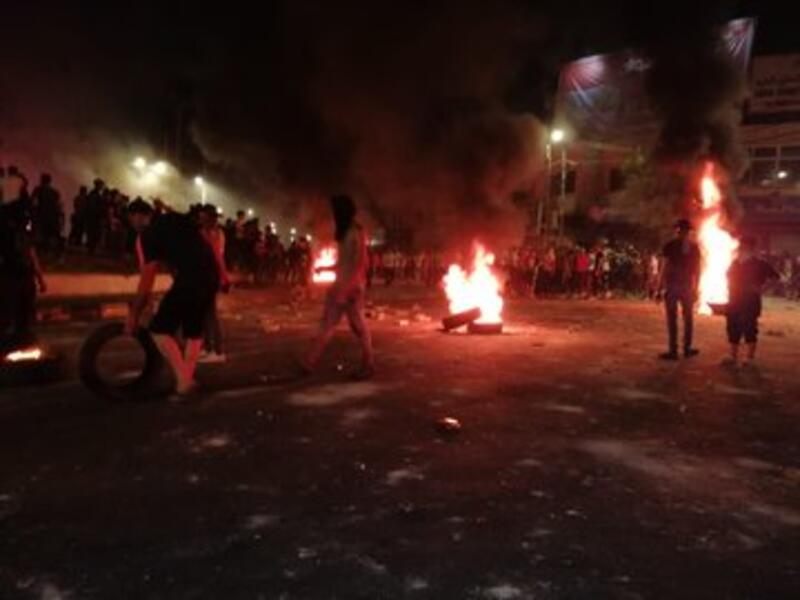 Protesters in Ramtha during small-scale riots that broke out on Friday that saw young people closing the main street in their northern district in protest against the government's decision to intensify measures on the Jaber border crossing with Syria. (Twitter)