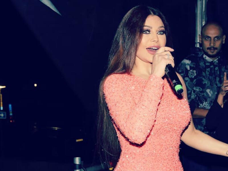 Haifa Wehbe chose a of a dazzling pink attractive summery dress for her concert in Gothenburg (haifawehbe - Instagram) Haifa Wehbe chose a of a dazzling pink attractive summery dress for her concert in Gothenburg haifawehbe Instagram