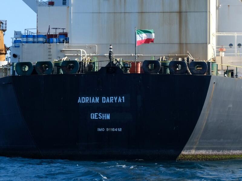 Iranian flag flutters on board the Adrian Darya oil tanker (AFP) Iranian flag flutters on board the Adrian Darya oil tanker (AFP)