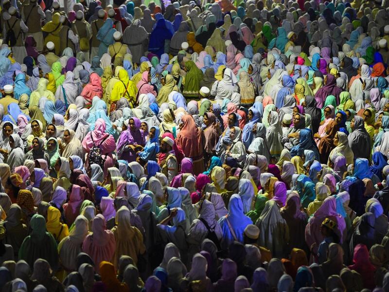 Muslim women pilgrims of the Dawoodo Bohra community take part in a Bohra ceremony in Colombo, in the run up to Ashura, one of the holiest days in Shiite Islam and commemorates the 7th century martyrdom of Prophet Mohammed’s grandson.  ISHARA S. KODIKARA / AFP