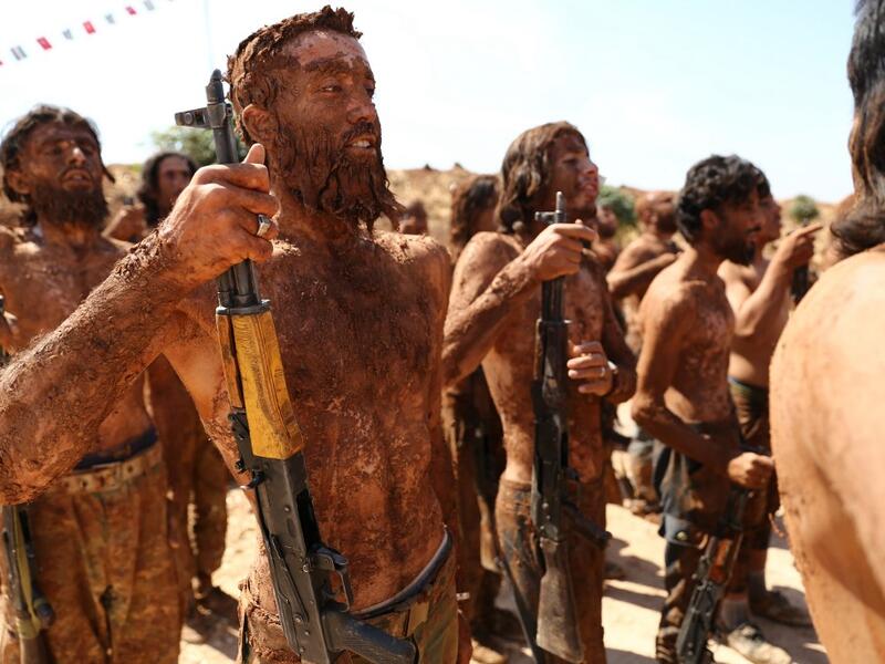 Turkish-backed fighters from al-Mutasim Brigade take part in a training at a camp near the Syrian town of Marea in the northern Aleppo district, on September 12, 2019. Nazeer Al-khatib / AFP