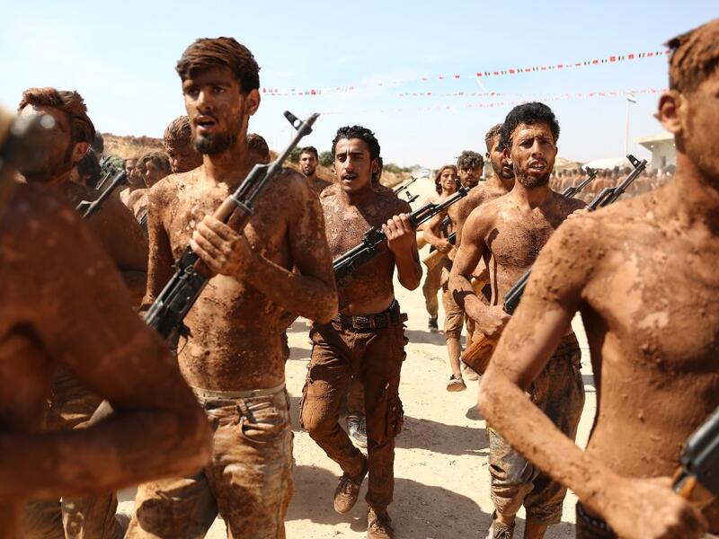 Turkish-backed fighters from al-Mutasim Brigade take part in a training at a camp near the Syrian town of Marea in the northern Aleppo district, on September 12, 2019. Nazeer Al-khatib / AFP