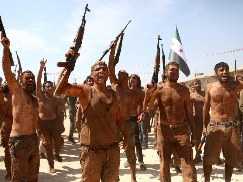 Syrian Turkish-backed fighters from al-Mutasim Brigade take part in a training at a camp near the town of Marea in Syria's northern Aleppo district, on September 12, 2019. Nazeer Al-khatib / AFP