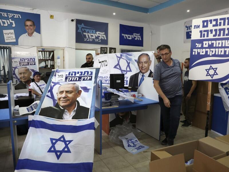 A picture taken on September 15, 2019 shows the electoral campaign headquarters for the Likud party, displaying banners of chairman and Israeli Prime Minister Benjamin Netanyahu in the southern Israeli city of Beersheva on September 15, 2019. HAZEM BADER / AFP