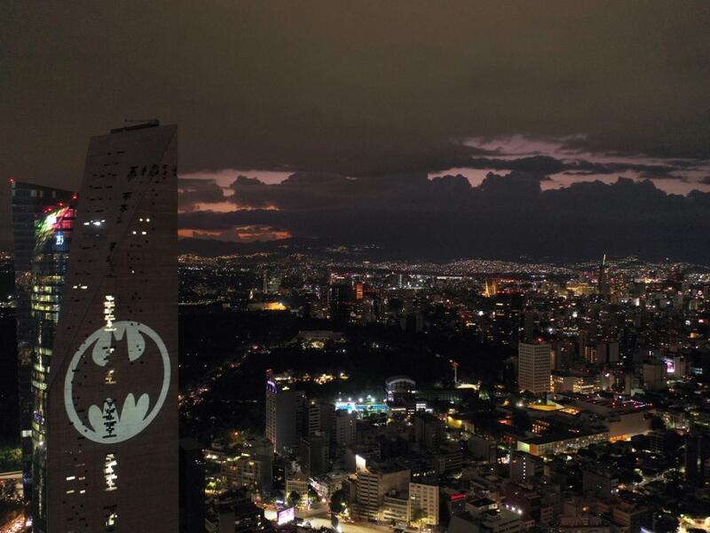 Aerial view of the Batman's symbol projected on the Reforma Tower on the 80th anniversary of US comics fictional superhero in Mexico City, on September 21, 2019. (ALFREDO ESTRELLA / AFP)