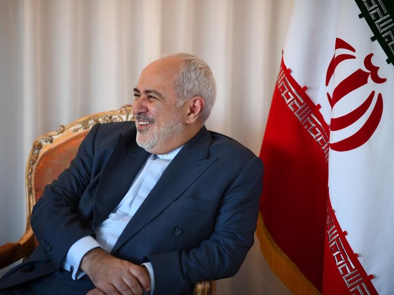 Mohammad Zarif, Foreign Minister of Iran smiles as he meets French Minister of Foreign Affairs Jean-Yves Le Drian (Not pictured) on September 22, 2019 in New York City. (Johannes EISELE / AFP)