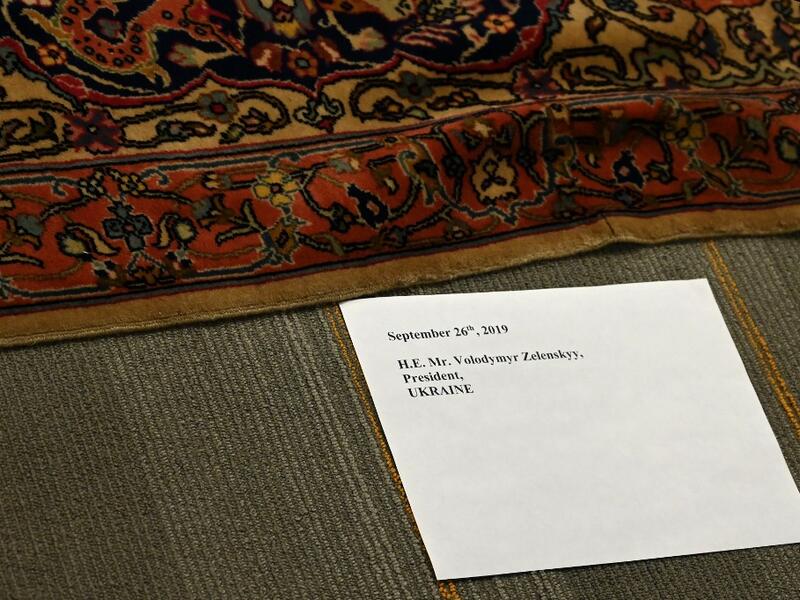 A place card is seen on the carpet for a photo op with Ukraine President Volodymyr Zelensky and the UN Secretary General António Guterres during the 74th Session of the General Assembly on September 26, 2019 in New York. TIMOTHY A. CLARY / AFP