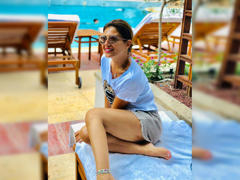 Menna enjoying her time by the pool side source @manoushafadali instagram