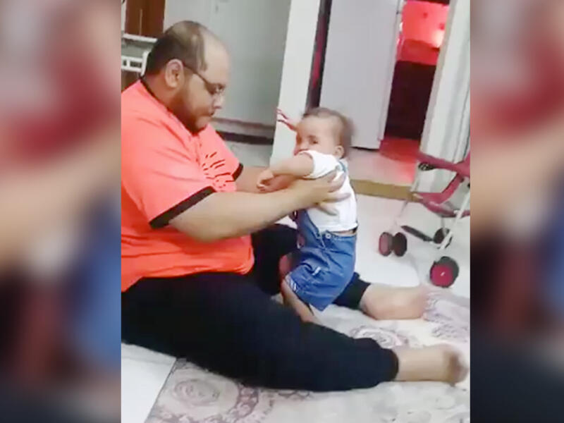 Palestinian resident of Saudi Arabia was filmed torturing the baby girl. (Video Screenshot)