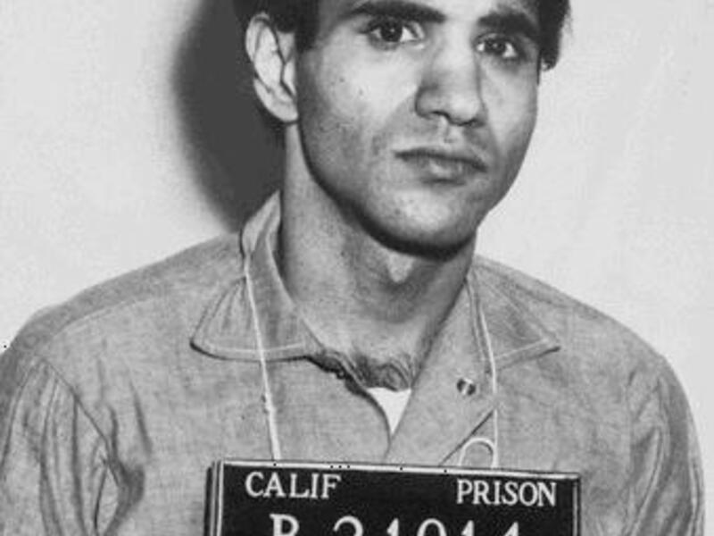 Sirhan Bishara Sirhan was hospitalized Saturday after being stabbed in a California prison. Sirhan, shown in a booking mug, was sentenced to life for killing U.S. Sen. Robert F. Kennedy, D-N.Y., in 1968. (Photo courtesy California Department of Corrections photographic records)