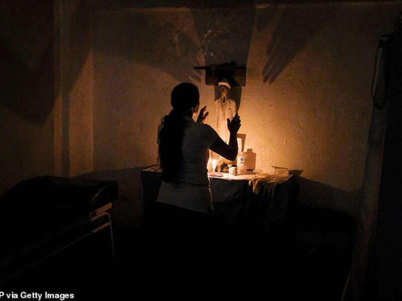 The spiritual leader spends time consulting with patients before performing rituals, as above, and prescribing them potions based on plants and fruits. (AFP/ File Photo) The spiritual leader spends time consulting with patients before performing rituals, as above, and prescribing them potions based on plants and fruits. (AFP/ File Photo)