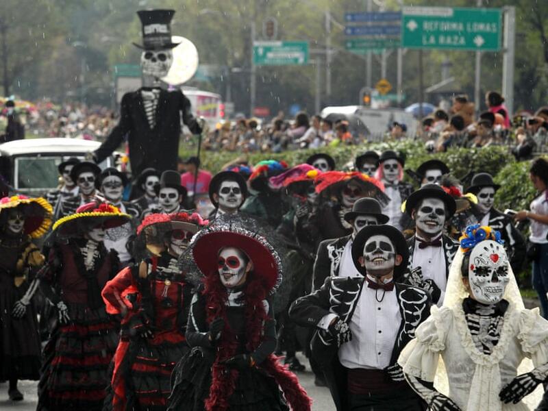 People take part in the Day of the Dead parade in Mexico City Ulises Ruiz/AFP/Getty Images