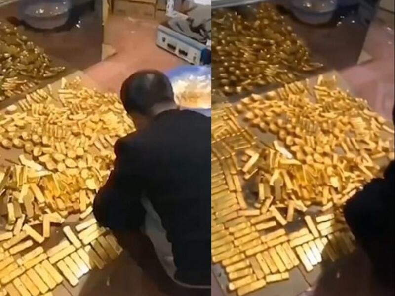 Thousands of golden bars and bricks were discovered by corruption inspectors at the man's home in Hainan Province, China, earlier this month. The official is being investigated. (Video Screenshot)