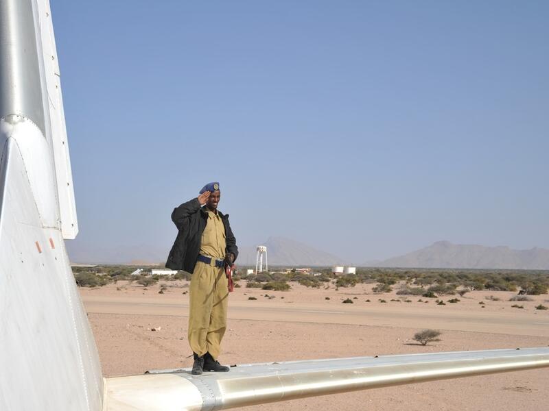 The police officer by crashed plane at the airport of Berbera. (Shutterstock/ File Photo) The police officer by crashed plane at the airport of Berbera. (Shutterstock/ File Photo)