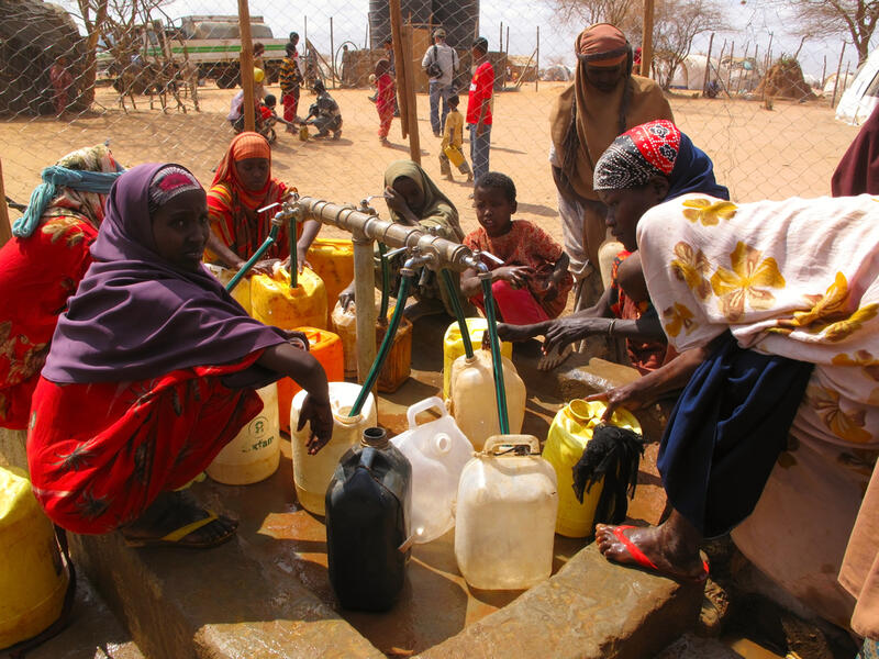 men, women & children wait for relief aid in the Dadaab refugee camp where thousands of Somalis end up due to hunger. (Shutterstock/ File Photo) men, women & children wait for relief aid in the Dadaab refugee camp where thousands of Somalis end up due to hunger. (Shutterstock/ File Photo)