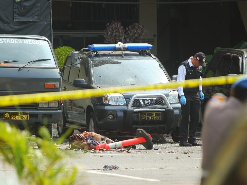 Indonesian police examine a body of a suspected suicide bomber at their headquarters in Medan, North Sumatra, on November 13, 2019, after a suicide attack occured during their morning roll call. (AFP/ File Photo) Indonesian police examine a body of a suspected suicide bomber at their headquarters in Medan, North Sumatra, on November 13, 2019, after a suicide attack occured during their morning roll call. (AFP/ File Photo)