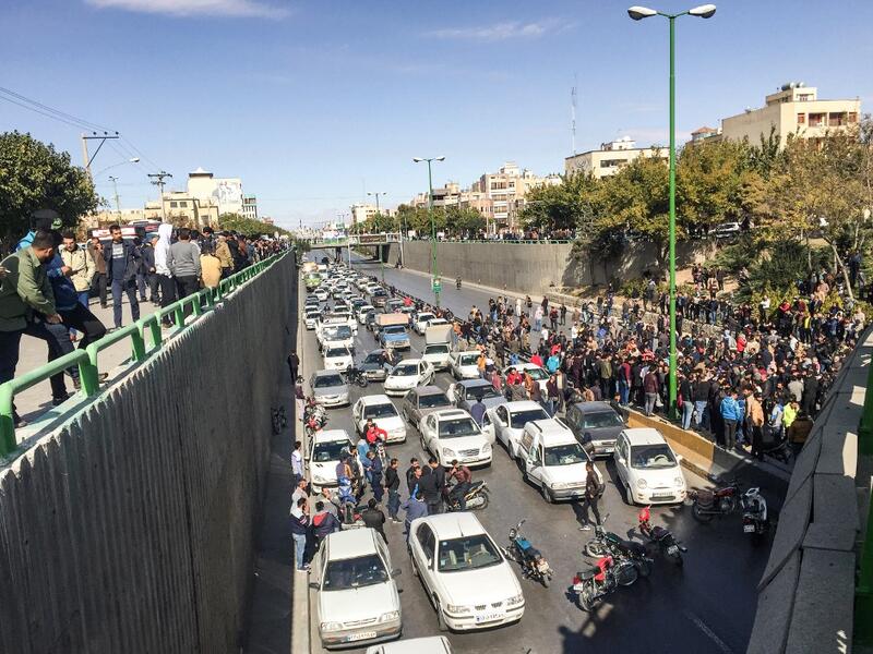 Iranian protesters block a road during a demonstration against an increase in gasoline prices in the central city of Isfahan, on November 16, 2019. AFP