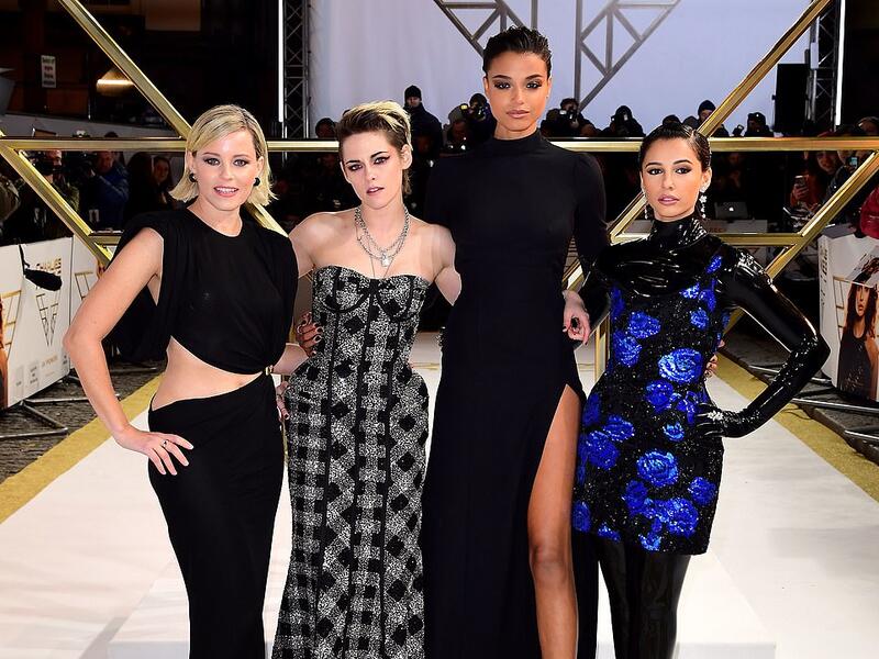 Kristen accessorised her look with a collection of chunky silver padlock