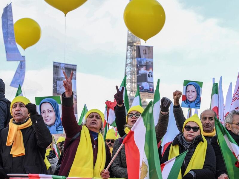 Iranians gather to protest against situation in Iran on the Parvis des droits de l'Homme in Paris on December 2, 2019. ALAIN JOCARD / AFP