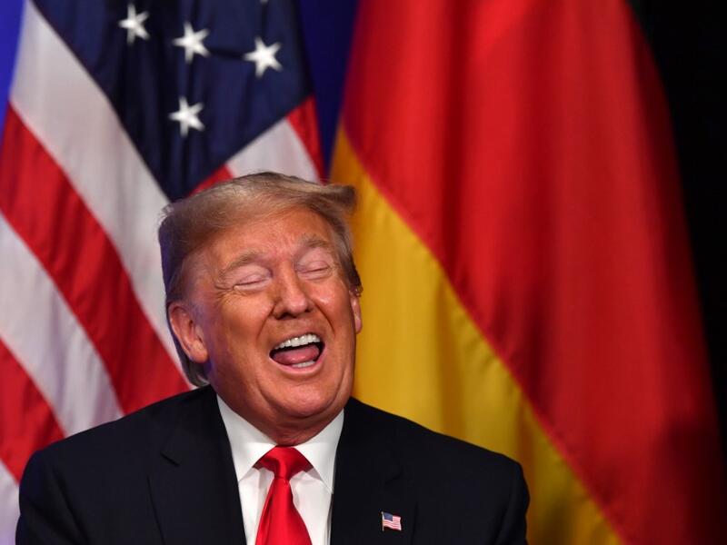 US President Donald Trump gestures during a bilateral meeting with German Chancellor Angela Merkel on the sidelines of the NATO summit at the Grove hotel in Watford, northeast of London on December 4, 2019. Nicholas Kamm / AFP