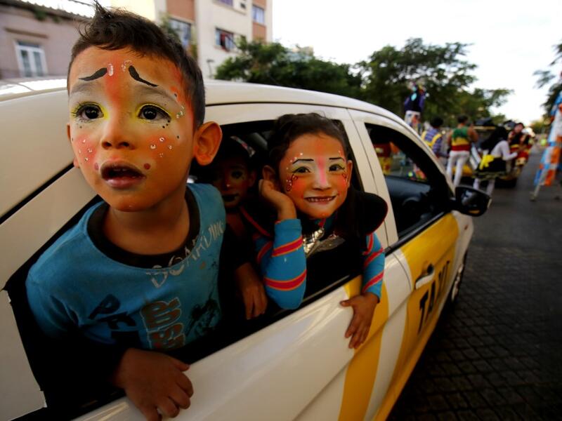 Clowns pose for a picture during the International Clown Day in Guadalajara, Mexico, on December 10, 2019. Ulises Ruiz / AFP